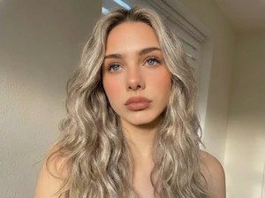Realistic Ash Blonde hair dye effect created by AI hair filter.