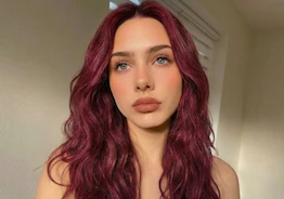 Burgundy Red hair color style generated by online AI hair changer.
