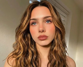 Caramel Balayage highlights effect on brown hair created by AI hair color changer.