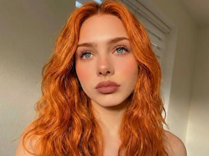 Bright Copper hair color effect generated by AI hair style app.