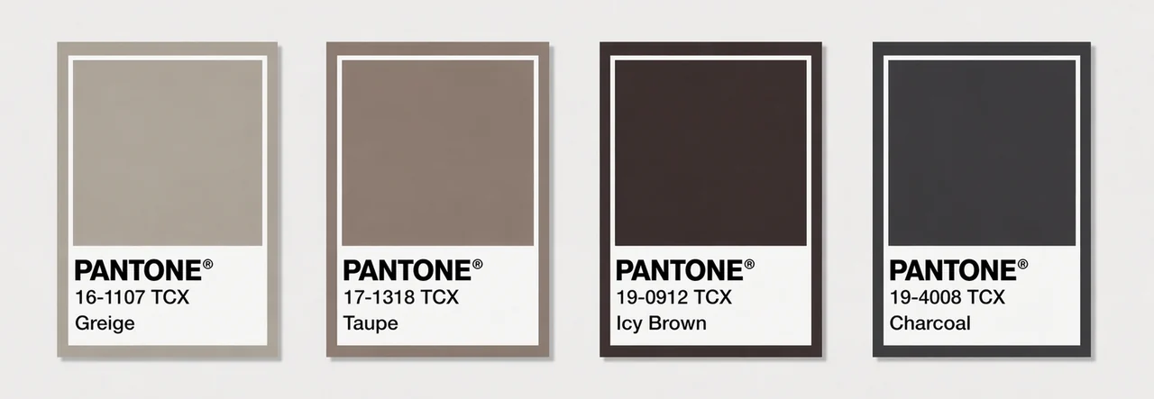 A set of cool neutral Pantone swatches, such as greige and icy brown, acting as perfect foundational basics for cool winter color palette clothes.