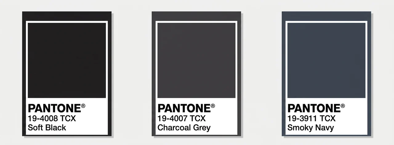 Pantone swatches of soft black, charcoal grey, and smoky navy for light summer color palette outfits